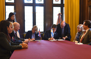 The signing of the document in Buenos Aires.
