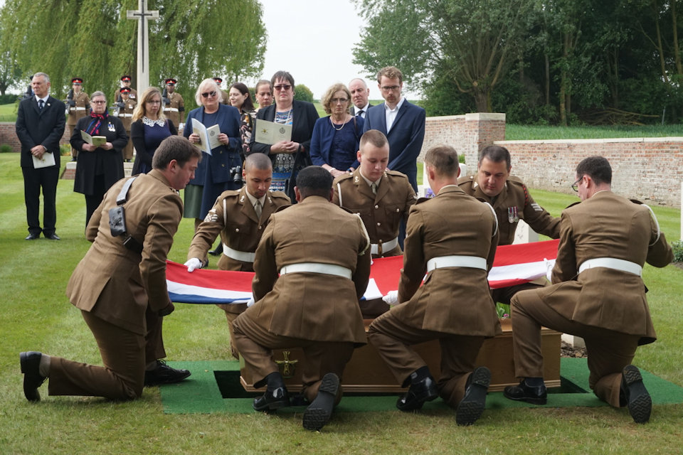 The Royal Artillery Regiment bearer party ceremonially fold the Union Flag during the service (Crown Copyright), all rights reserved