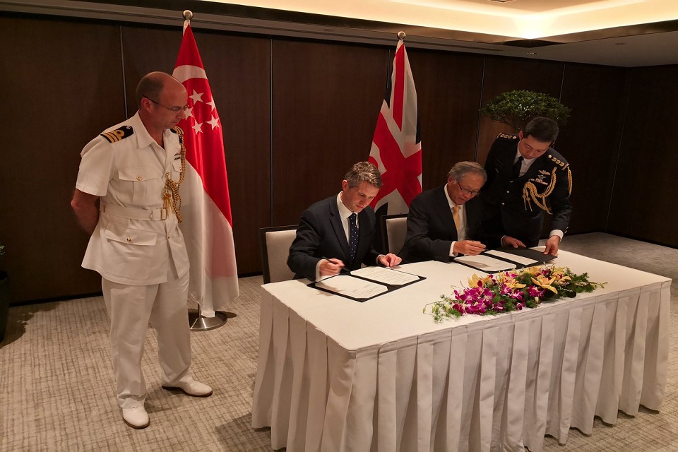 A Memorandum of Understanding, strengthening defence ties between the UK and Singapore, being signed in the margins of the summit by Mr Williamson and his counterpart Ng Eng Hen.