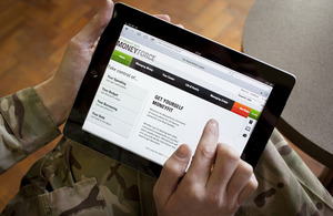 A member of the Armed Forces accessing the MoneyForce website [Picture: Matt Cetti-Roberts/Frontline Pictures]