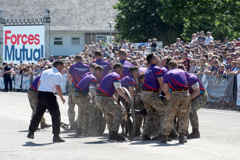 The Defence Medical Services Field Gun Crew competing in the Royal Navy and Royal Marines Charity Field Gun Competition.