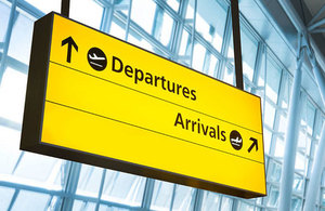 Airport departures and arrivals sign.