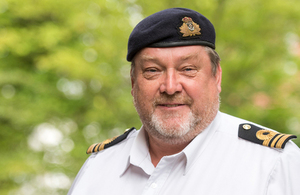A picture of Lt Cdr Clarke, Royal Navy Reservist, who works at JFC