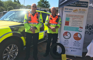 Traffic officers Julian Morant and Adrian Smith alongside the Highways England stand at the towing and tyre safety event at Gordano Services