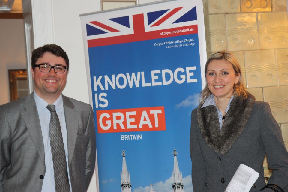 UKTI Trade Advisor with Ms Marija Vujica from the Agency for education and translations "Libar" standing in front of the Knowledge is GREAT banner.