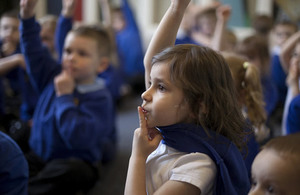 children with hands up