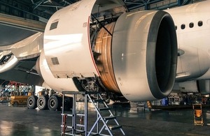 Engine cover of an aircraft opened for maintenance via thanun vongsuravanich at Shutterstock