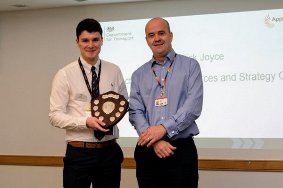 Image of Tom Parkin collecting the DfT Apprentice of the Year award