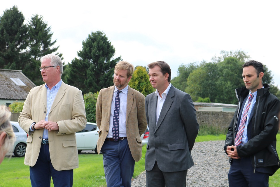 Image shows partners on th enew flood bank 