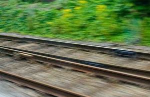 Picture of rail tracks from in motion train.