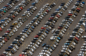 A photograph of a busy car park.