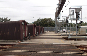 View of part of the level crossing at the west end of Dollands Moor yard looking north