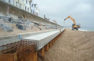 The sea wall at Torcross, above which is a row of houses