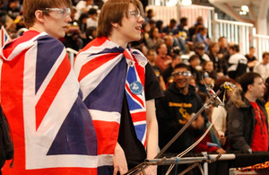 The students look at as the competition takes place on the main floor.