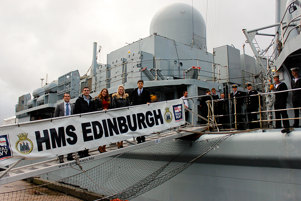 Guests line up to board the HMS Edinburgh.