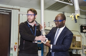 Science Minister Sam Gyimah trying out remote handling technology on the European JET fusion experiment at Culham