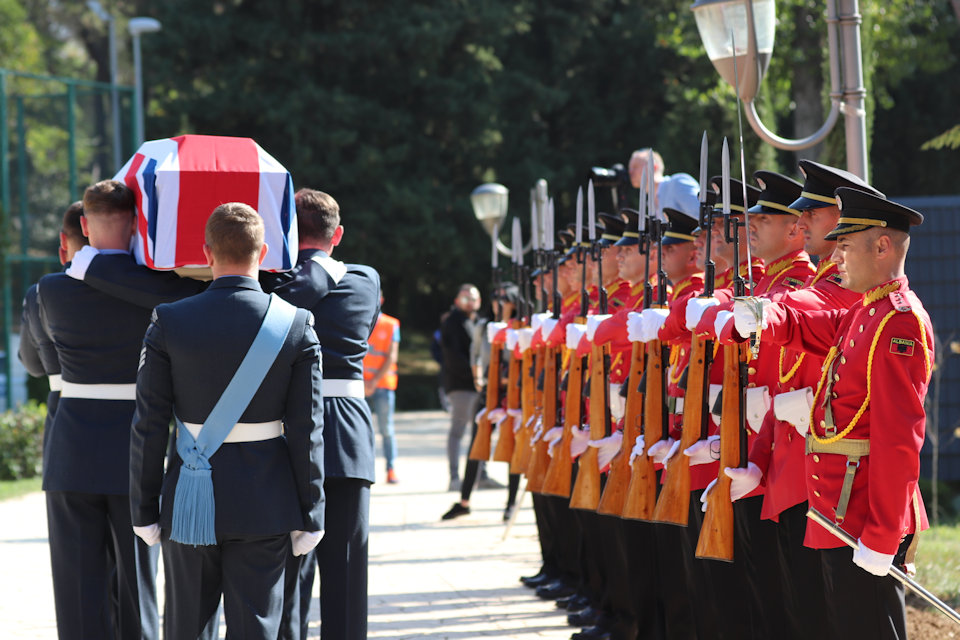 The coffin passes the Albanian Guard of Honour, Crown Copyright, all rights reserved