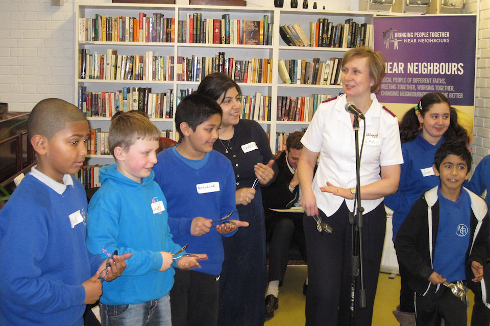 Baroness Warsi plays the spoons with children from the 'Baby Song' group