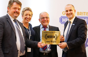 Crickhowell High Street winners receive their certificate as overall winner of the Great British High Street Awards 2018