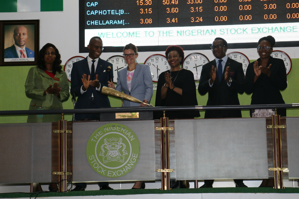 Deputy High Commissioner to Nigeria Laure Beaufils ringing the stock bell at the Nigerian stock exchange