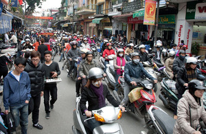 Moped traffic in Hanoi. Photo by Funky Chickens used under flickr creative comms license