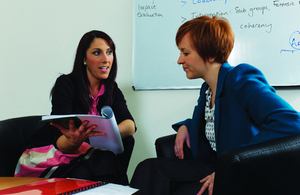 Image: two women in a meeting