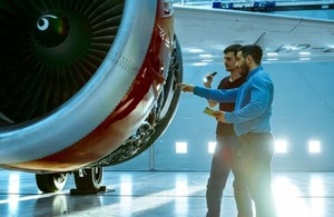 Maintenance engineers diagnose a jet engine via Gorodenkoff at Shutterstock