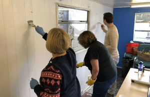 Highways England staff painting the art room