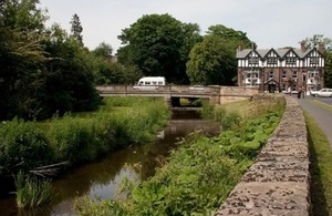 Image shows Ponteland bridge and river