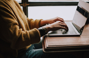 Person at laptop on desk