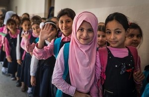 Iraqi girls at a school in Mosul. 38 schools have been rehabilitated with UK funds, 28 of which are in Mosul. Picture: UNDP