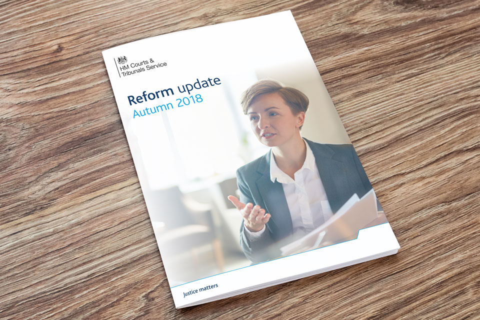 Image of cover of reform update document on a table.