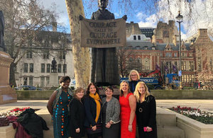 Members of the WiN Cumbria team with Trudy Harrison MP at the Millicent Fawcett statue in London