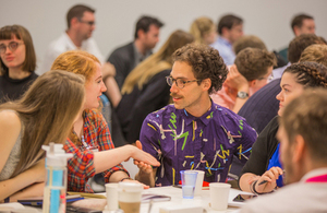 People greeting each other at a Digital, Data and Technology (DDaT) Fast Stream induction event