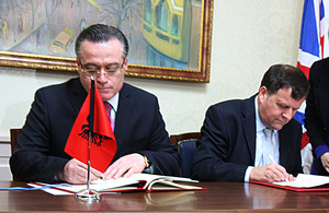 The British Ambassador Nicholas Cannon and the Albanian Minister of Finance Ridvan Bode