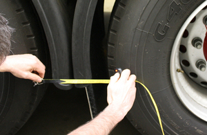 Picture of tyre being measured.