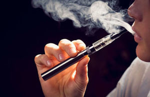 Young person using an e-cigarette