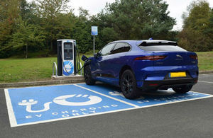 Electric car at charging point