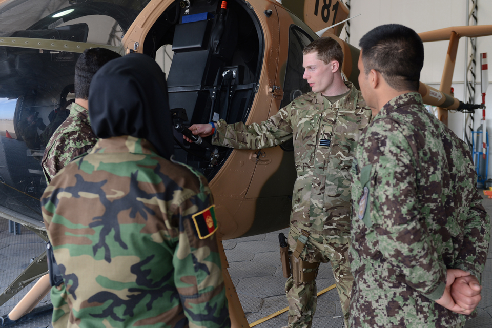 Flight Lieutenant Oliver Burrell with a group of Afghan Air Force recruits