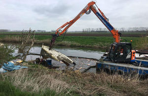 The 'Compass Rose' being removed from the River Lark by the Environment Agency