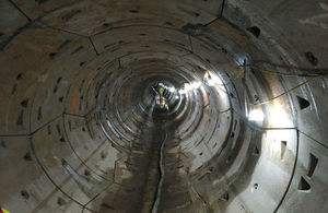 This tunnel will take water away from homes to safely flow into the river downstream.