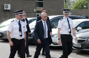 Home Secretary Sajid Javid with police