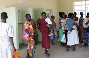 Women queue at medical centre in Kenya.