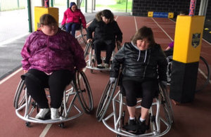 Adults with autism enjoying wheelchair rugby