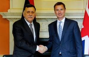 Libyan Prime Minister Fayez Al-Serraj with Foreign Secretary Jeremy Hunt.