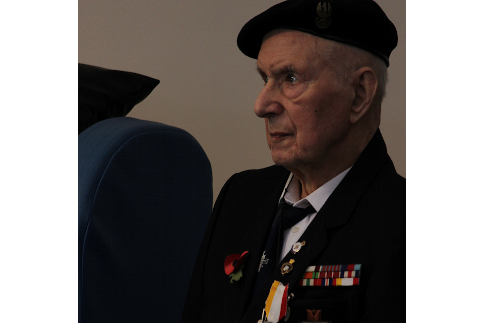 Resident Mr Zenon Slomka watching the service. MOD Crown Copyright.