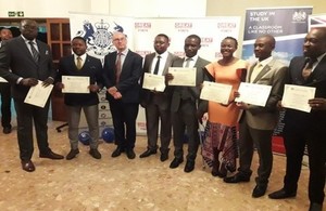 British High Commissioner to Yaounde, Rowan Laxton with the returning Chevening scholars