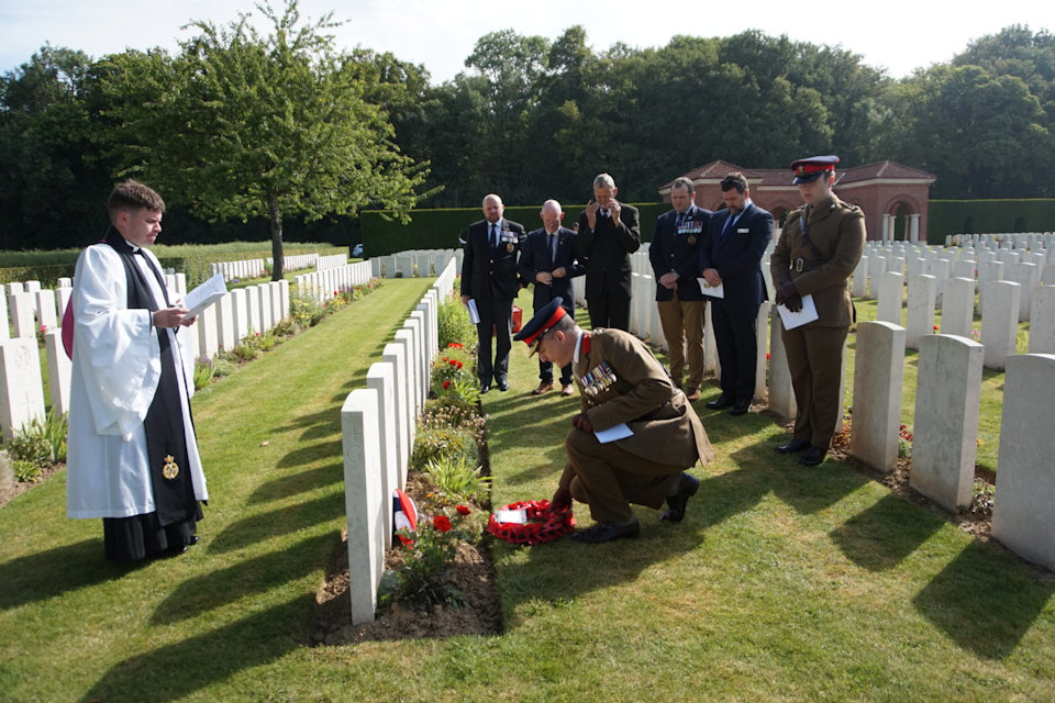 Col Martin David MC, representing the British Embassy in Paris, lays a wreath at the graveside of Cpl Davies, Crown Copyright, All rights reserved