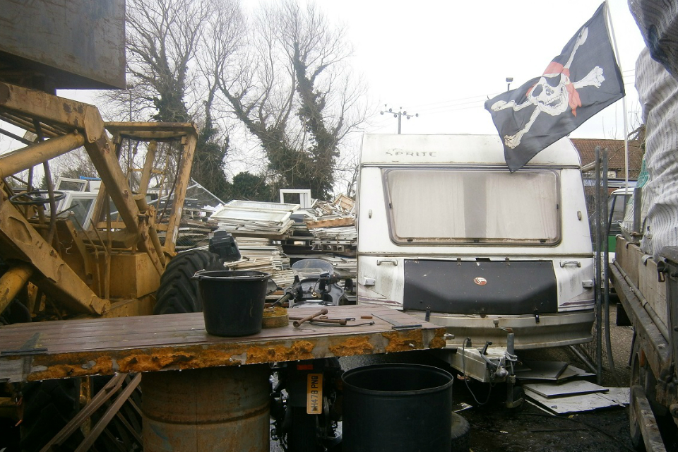 Piles of waste which were illegally stored at Fairfield Garage in Hilgay, Norfolk