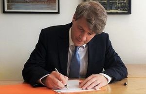 Chris Skidmore signs legislation to commit the UK to a legally binding target of net zero emissions by 2050